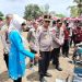 PJs. Bupati Dompu dampingi Polda NTB Serahkan Bantuan Sosial